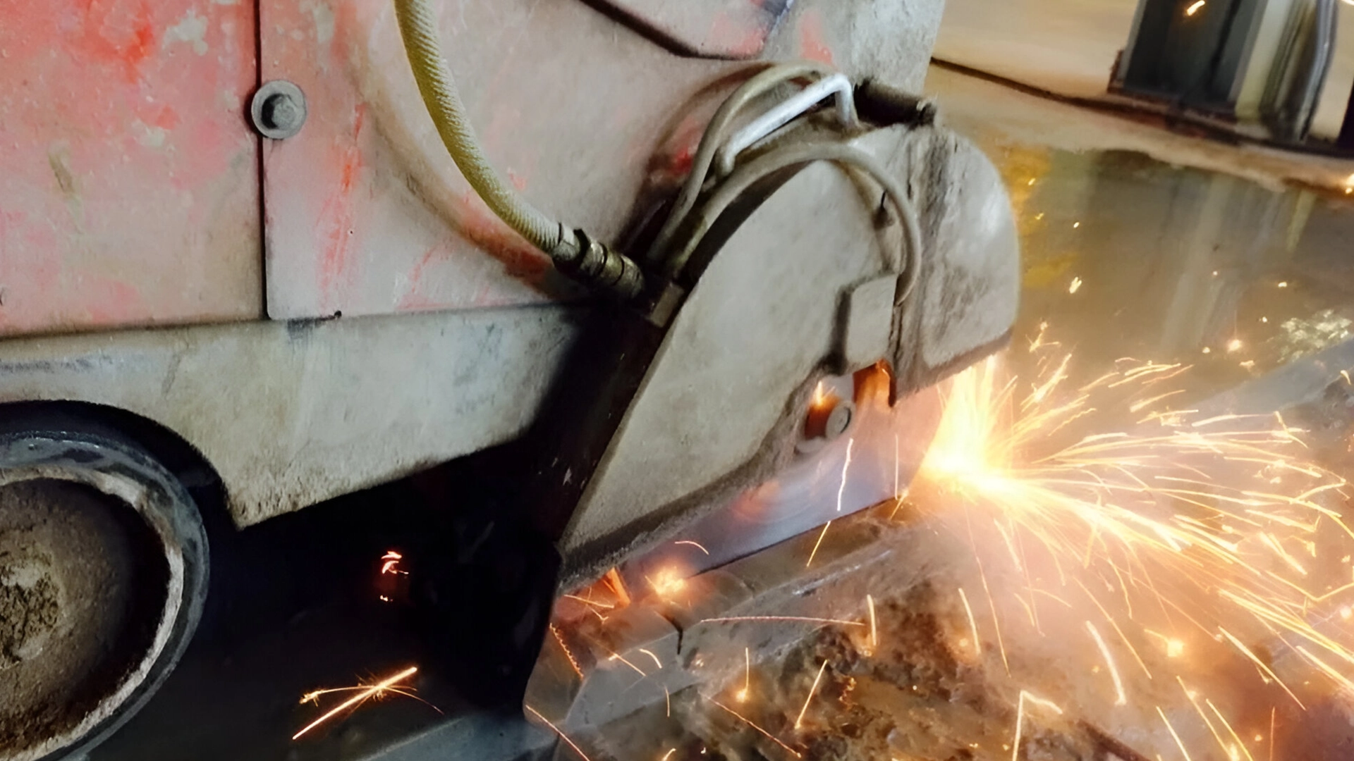 Industrial concrete cutting with sparks